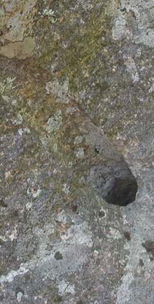 Iron mine holes in rock (photo by Karl Searl)