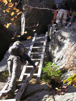 Descending the ladders below Mount Morgan's summit (photo by Mike Dickerman)